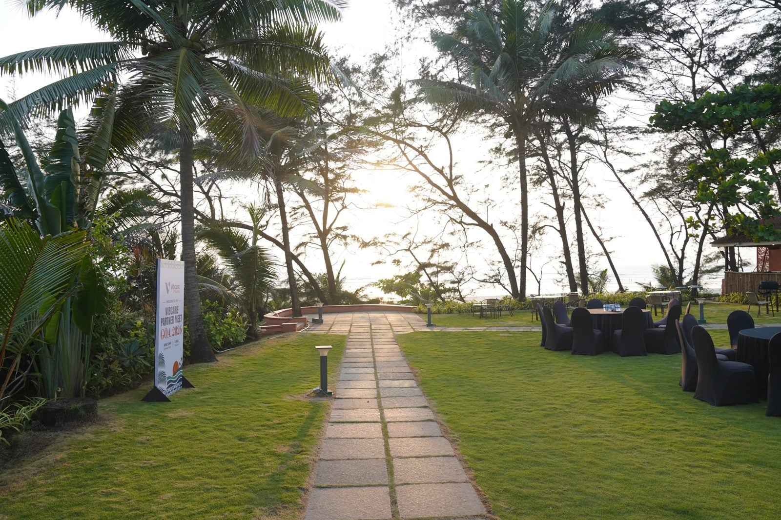 Resort garden path with the Vibcare Partner Meet standee