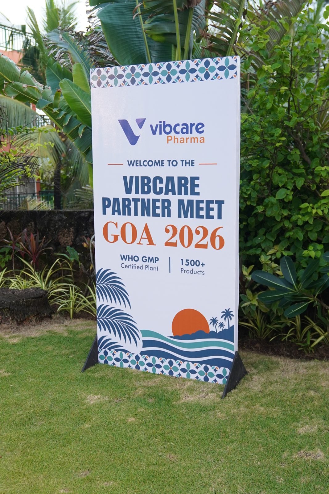 Vibcare Partner Meet Goa 2026 standee on the lawn
