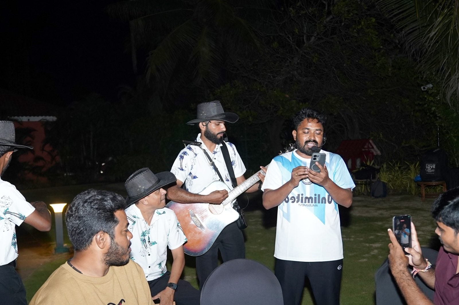A partner singing with the band